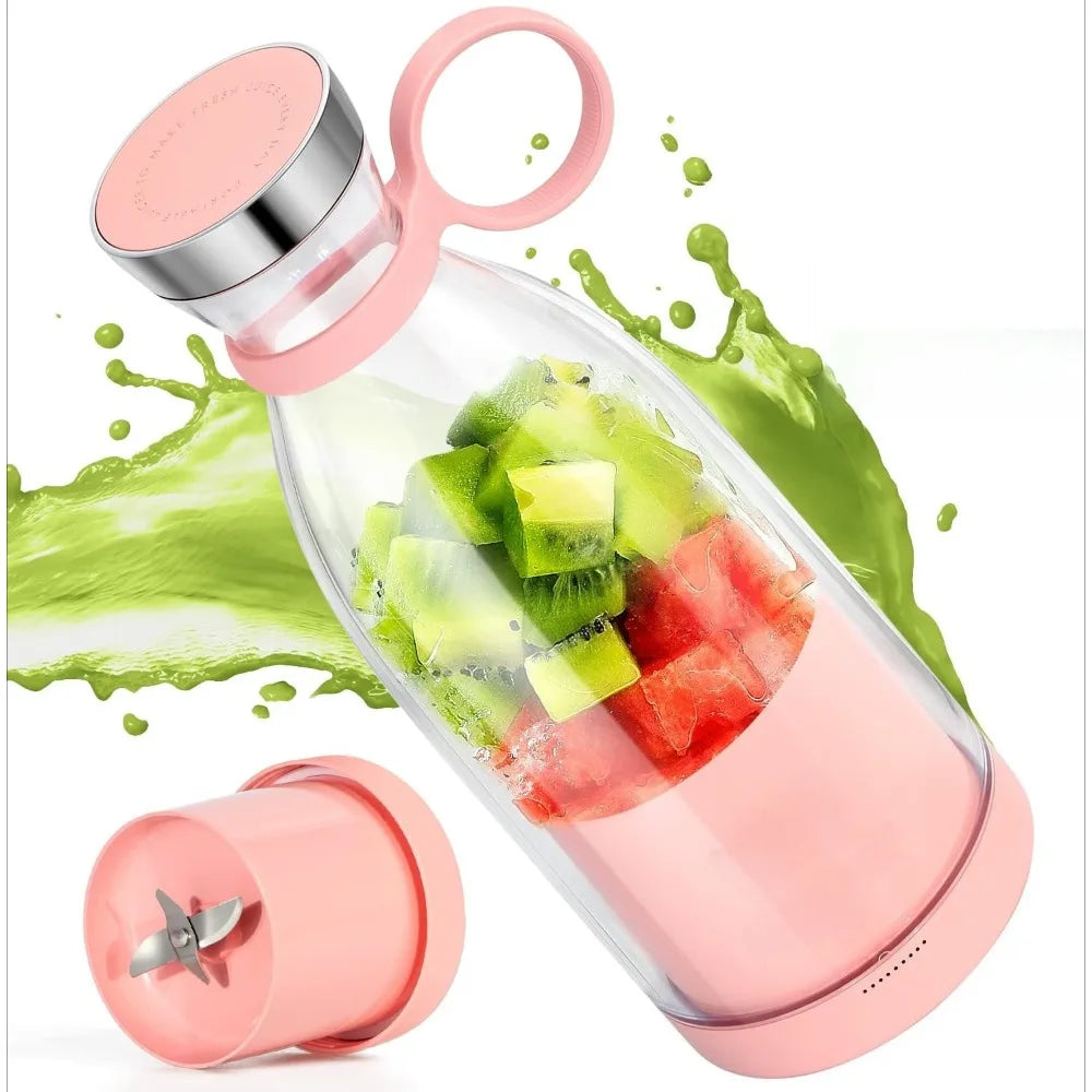 Portable pink electric blender bottle filled with kiwi and watermelon, shown with a detachable base and splash effect.