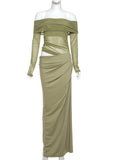 Olive green long-sleeve off-shoulder maxi dress with ruched mesh, cutout waist, and asymmetric drape.