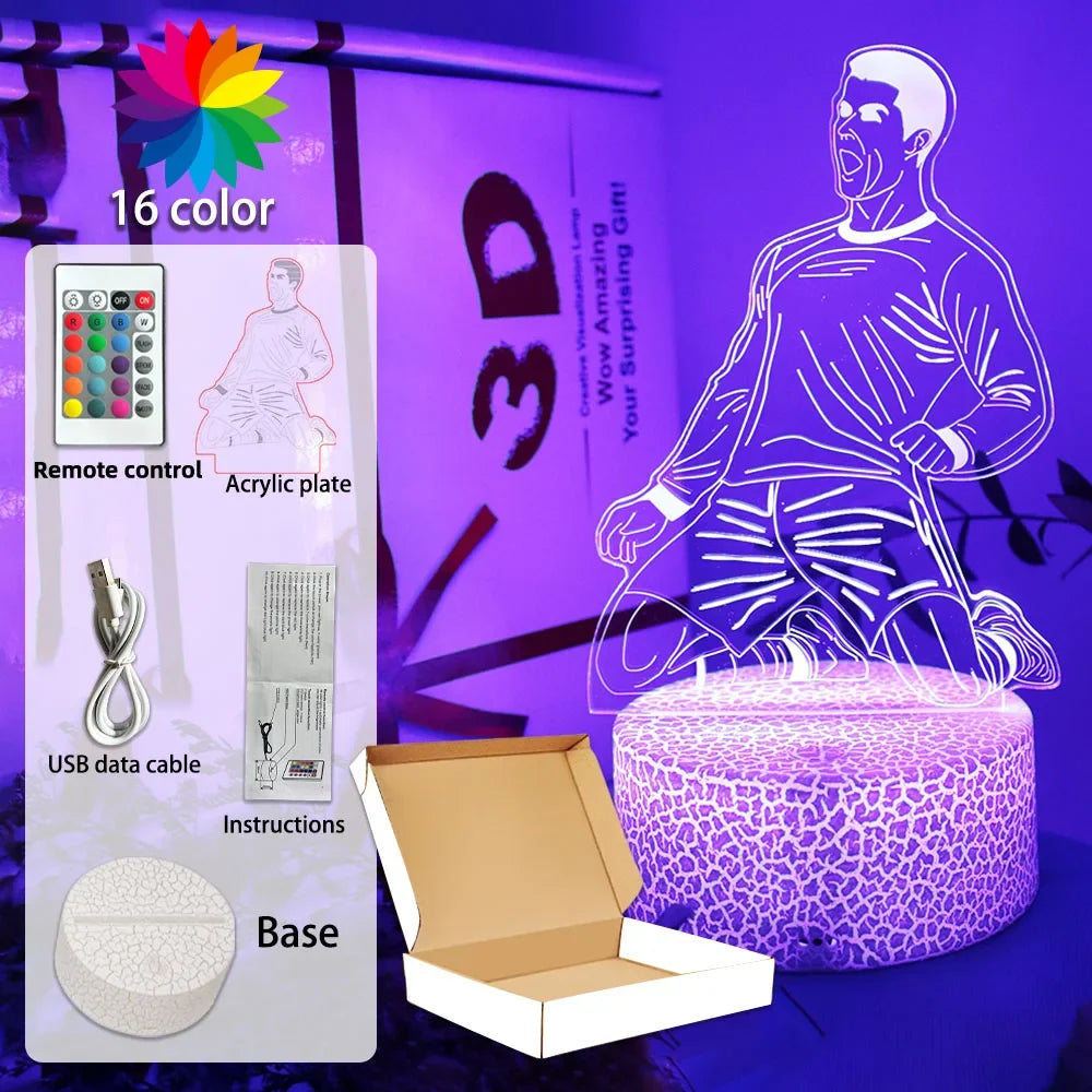 3D football player illusion lamp with 16 colour-changing LEDs, remote control, USB cable, and crackle-effect base.