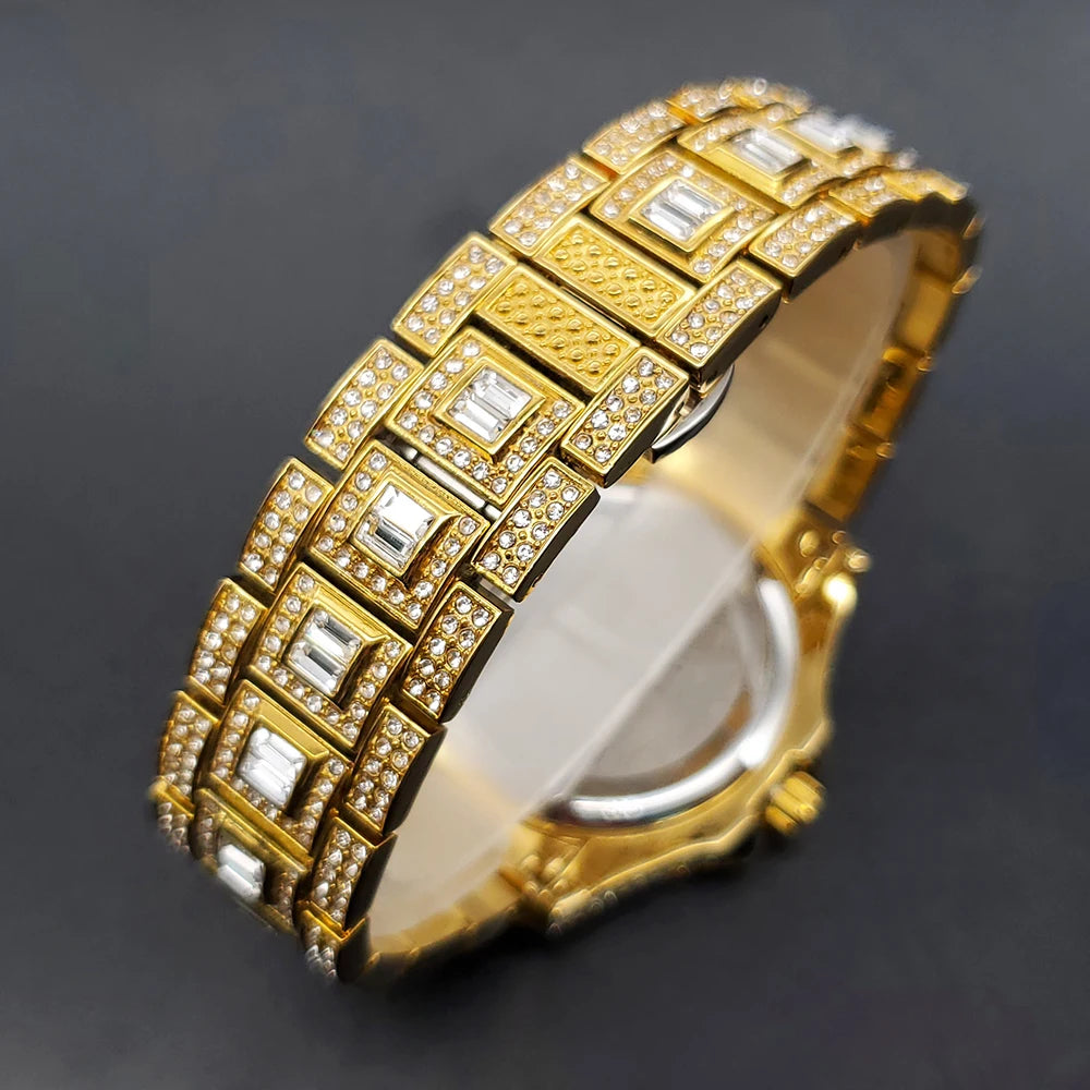 Elegant gold-tone women's dress watch with a crystal-encrusted linked strap and baguette-cut accent stones.