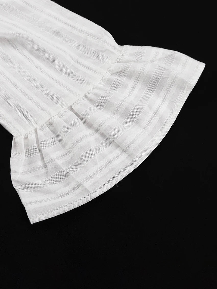 White, sheer-striped long sleeve with a flared, ruffled cuff detail.