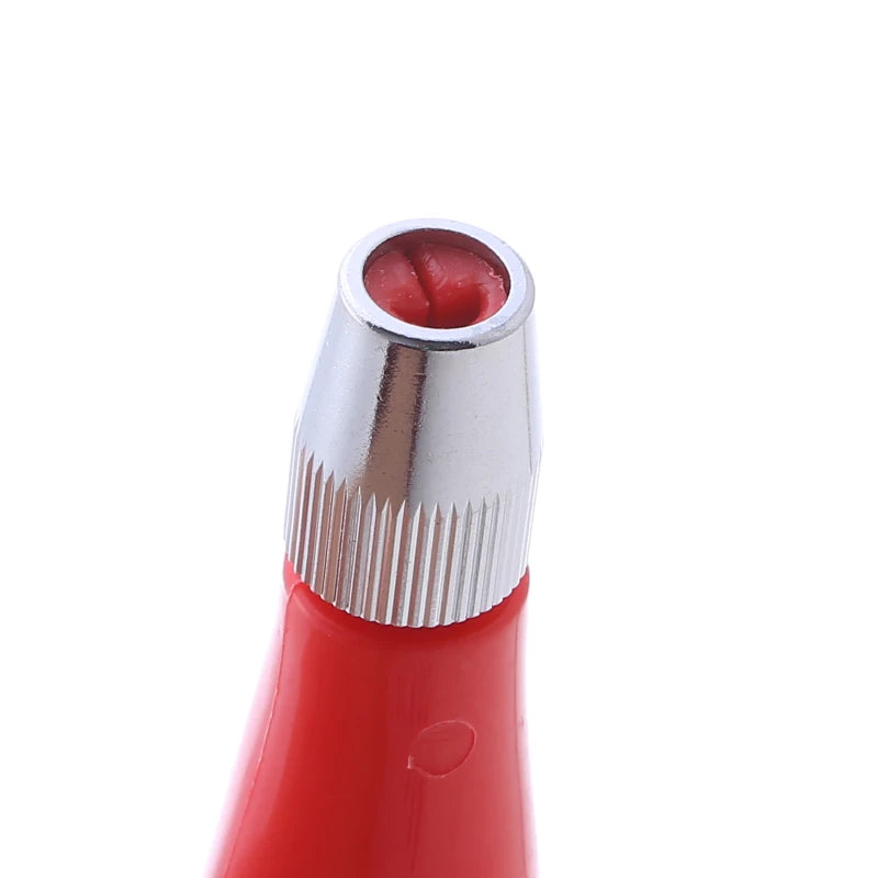 Close-up of a precision tool with a red plastic handle and a textured, chrome-finish metal collet chuck tip.