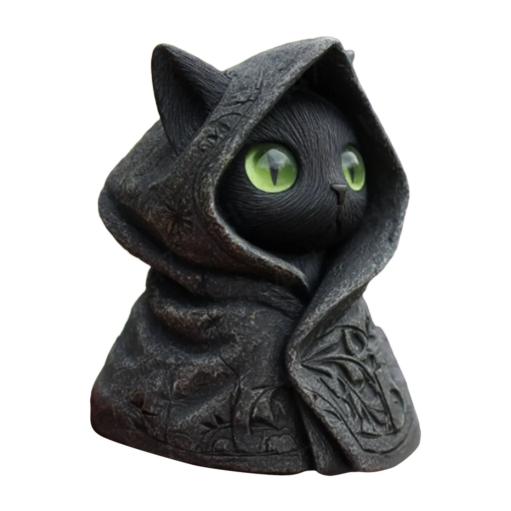 A mystical black cat ornament wearing a textured, hooded cloak with detailed carvings and striking bright green eyes.