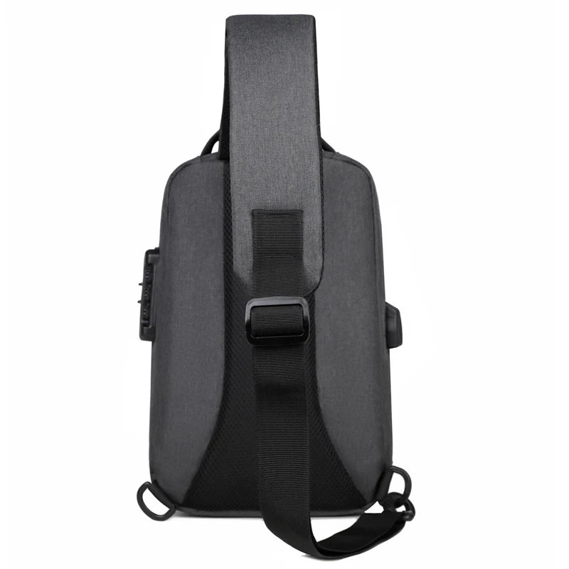 Dark grey anti-theft crossbody bag with adjustable strap, integrated USB charging port, and combination lock.