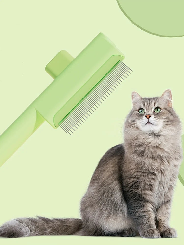 A pale green grooming brush for pets hovering over a long-haired grey cat on a matching light green background.