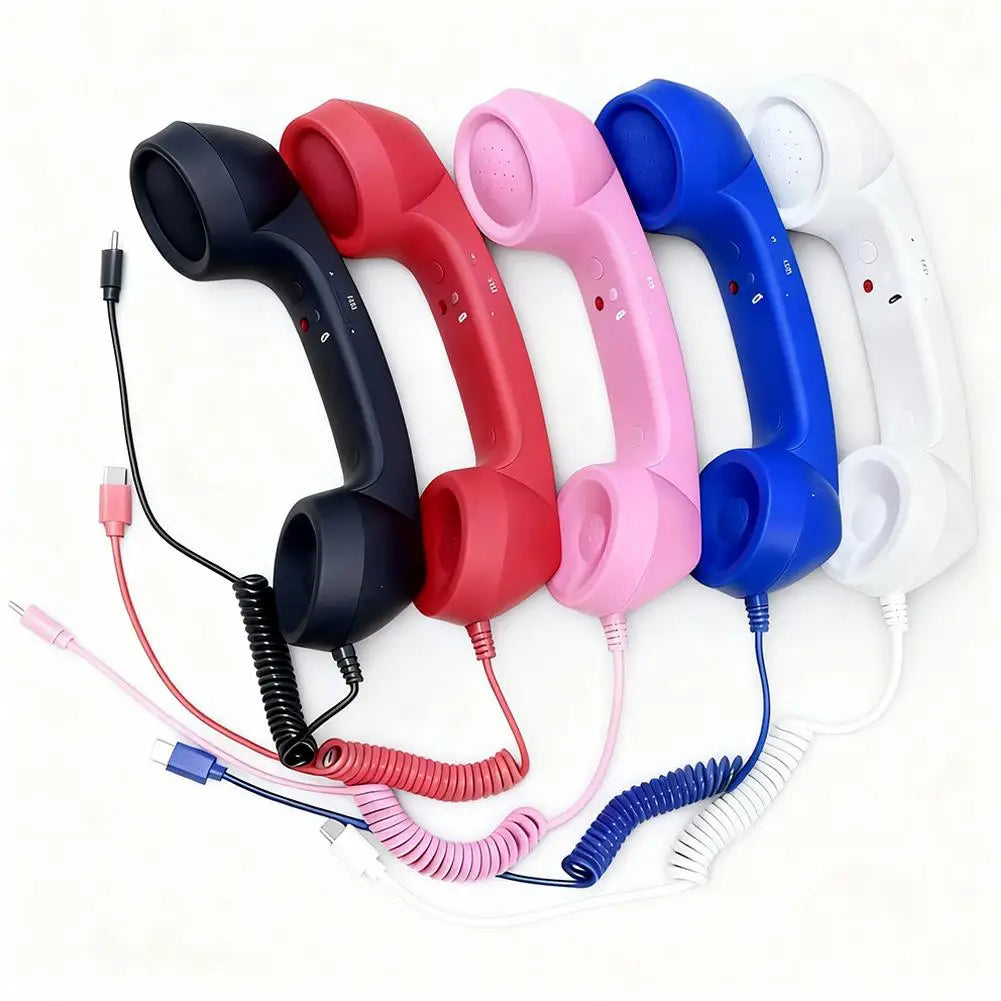 Five vintage-style phone handsets in black, red, pink, blue, and white, each with a matching coiled cord and connector.