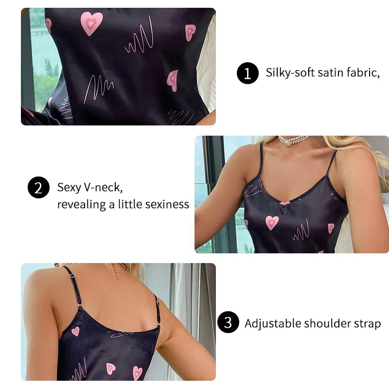 Black satin camisole with pink heart print, V-neck, and adjustable spaghetti straps.