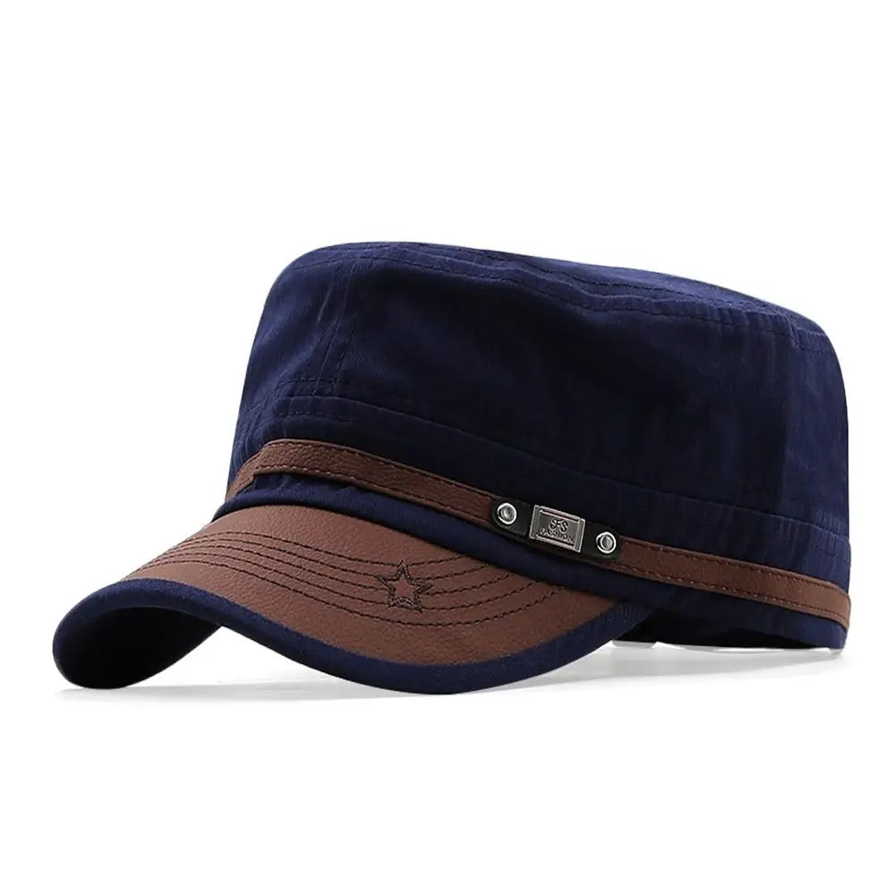 Navy blue cadet-style cap with a brown faux-leather peak, star detailing and a decorative side strap.