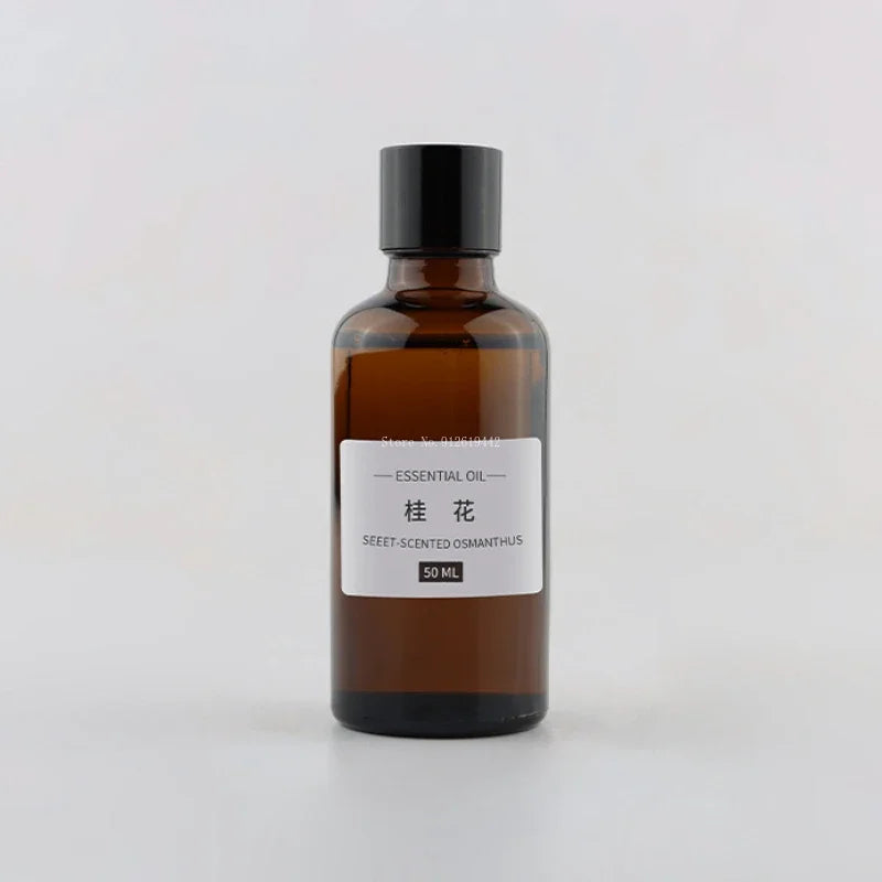 50ml amber glass bottle of Osmanthus essential oil with a black screw-top lid and a simple white label.