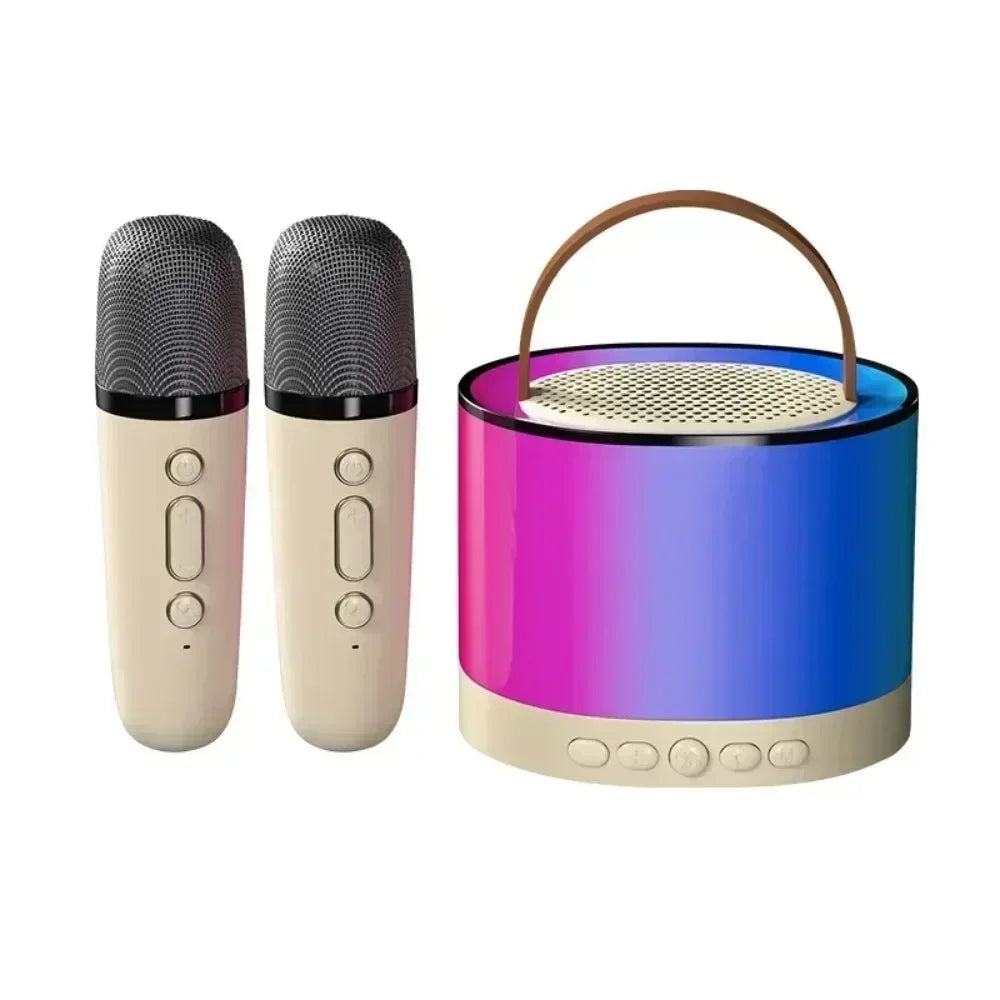 Portable cream karaoke speaker with dual microphones, a carry handle, and vibrant pink and blue RGB LED lights.