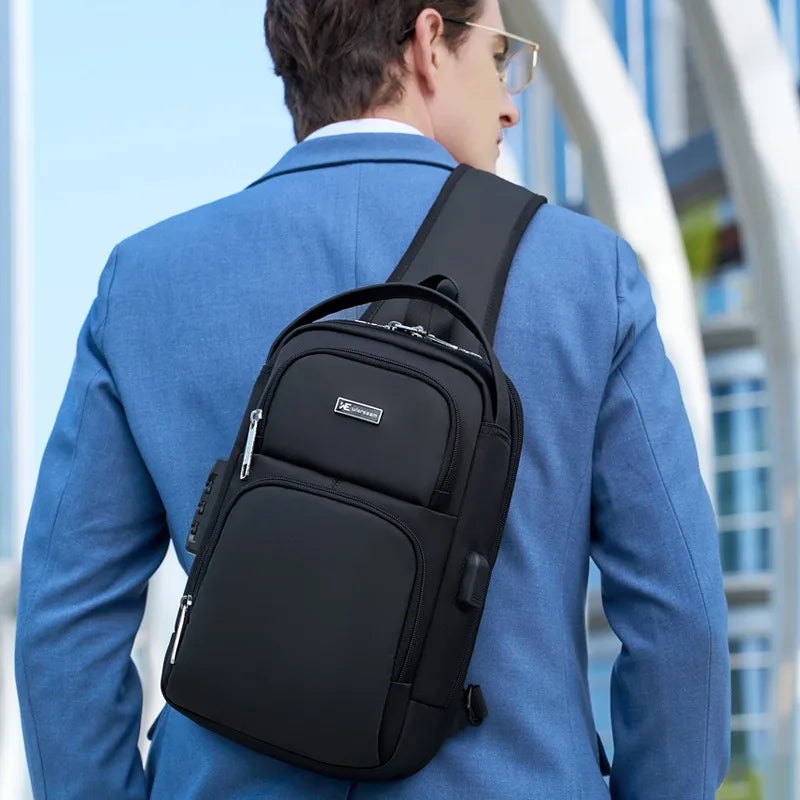 A sleek black waterproof travel sling bag with a built-in combination lock, worn over the shoulder by a man in a blazer.
