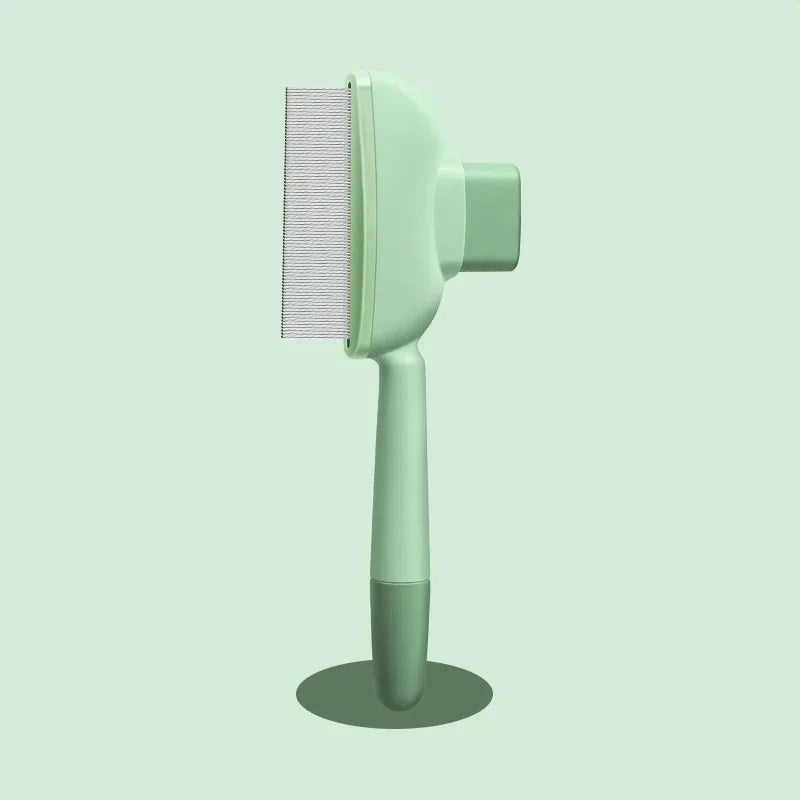 A sage green pet grooming comb with fine metal teeth, standing upright on a matching circular base.