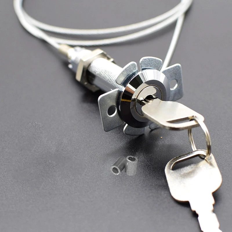 Silver metal cylinder key lock with steel cable, mounting plate, and two keys on a keyring.
