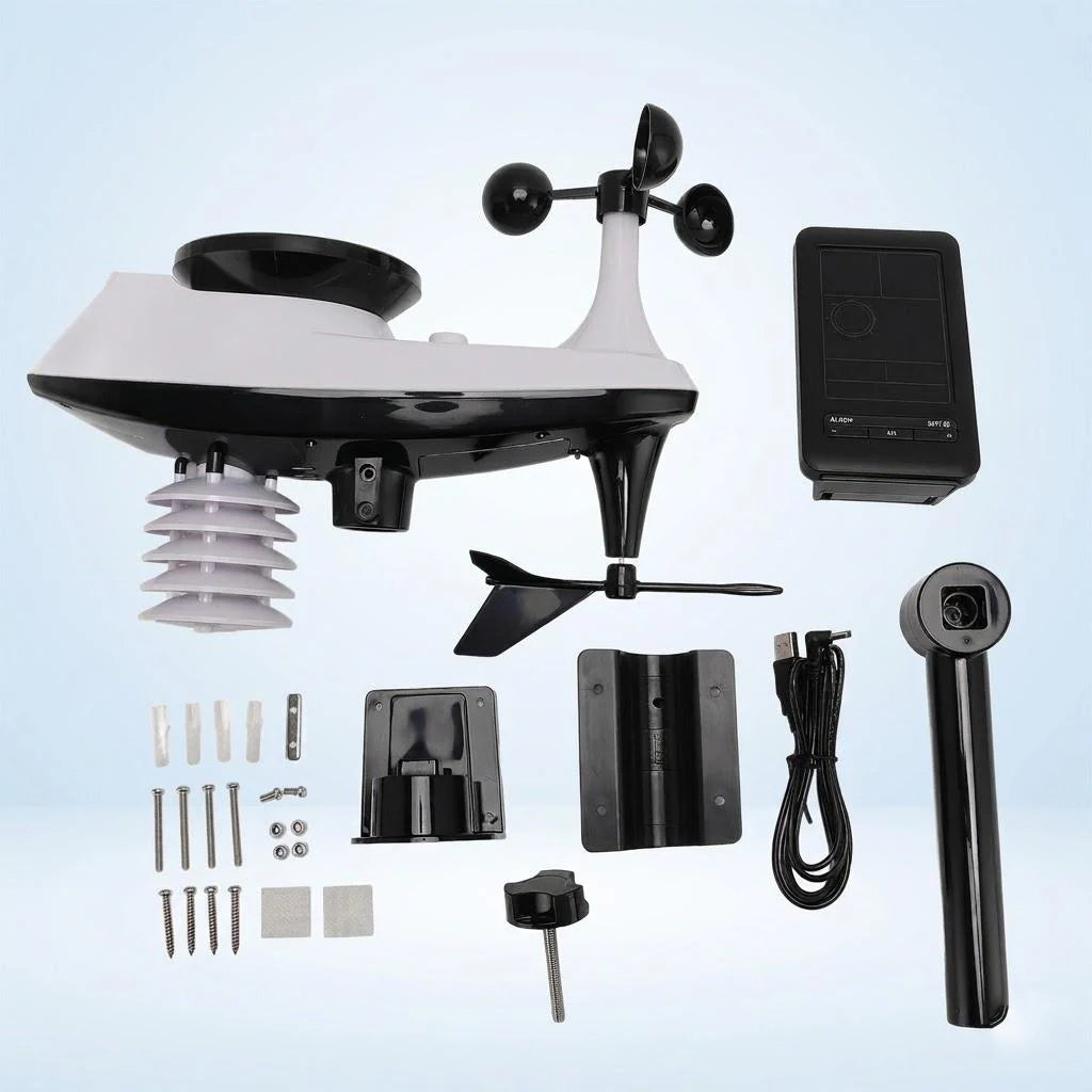 White and black smart weather station with outdoor sensor array, mounting brackets, screws, and USB charging cable.