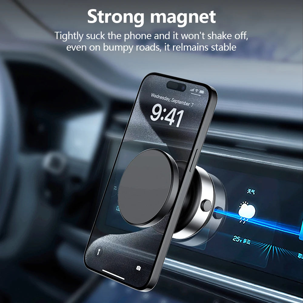 Black magnetic car phone mount attached to a vehicle dashboard, holding a smartphone securely.