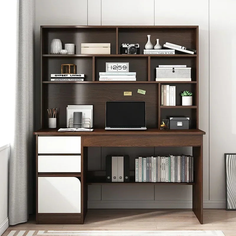 Dark brown wood computer desk with built-in hutch, three white drawers on the left, and lower shelving for books.