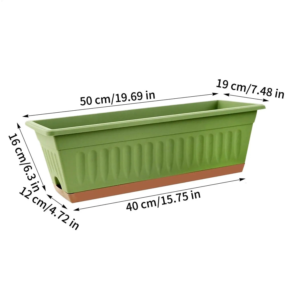Green rectangular plastic planter with ribbed sides and a brown base, shown with measurement labels in inches and cm.