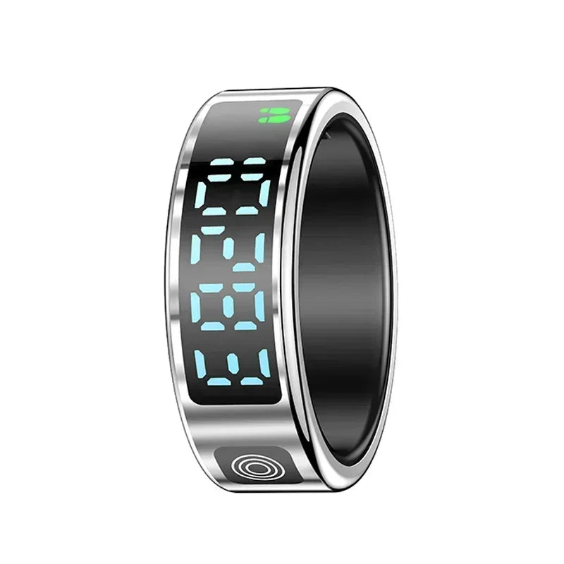 Sleek silver smart health tracker ring with a black digital display showing blue numbers and green step icons.