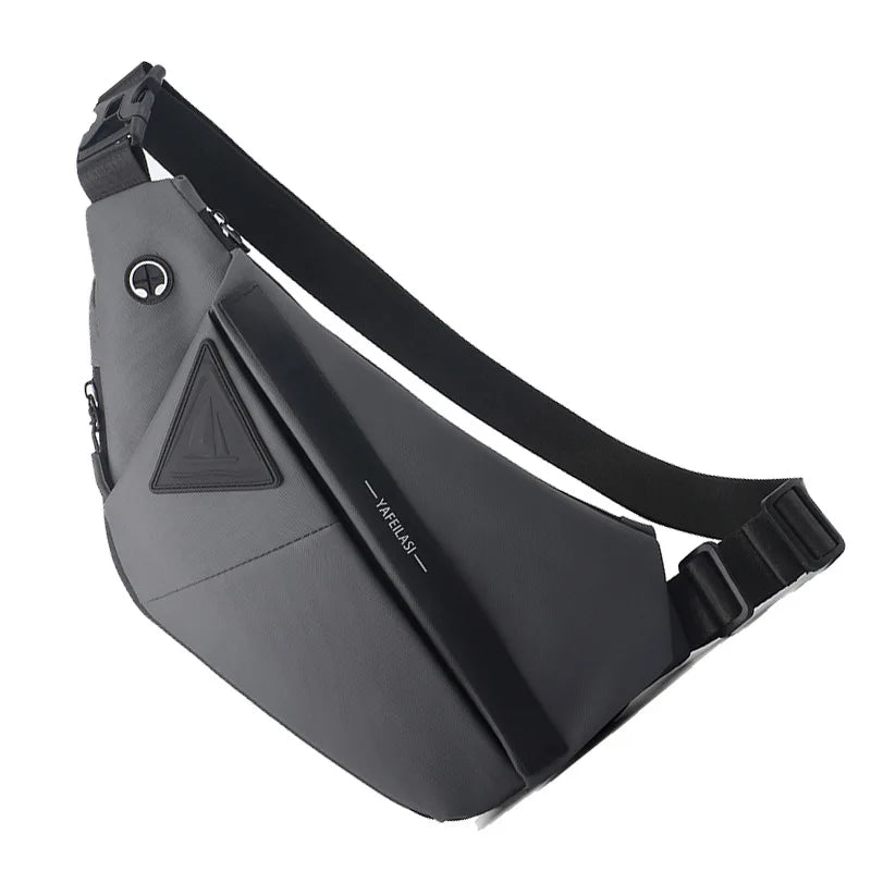 Grey men’s anti-theft crossbody sling bag with a secure black strap, earphone port, and sleek, modern design.