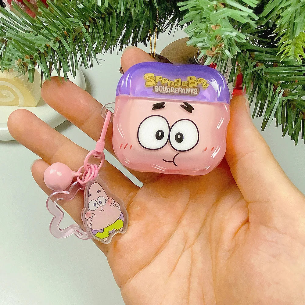 Pink and purple silicone AirPods case featuring Patrick Star character design with matching charm, held in a hand.