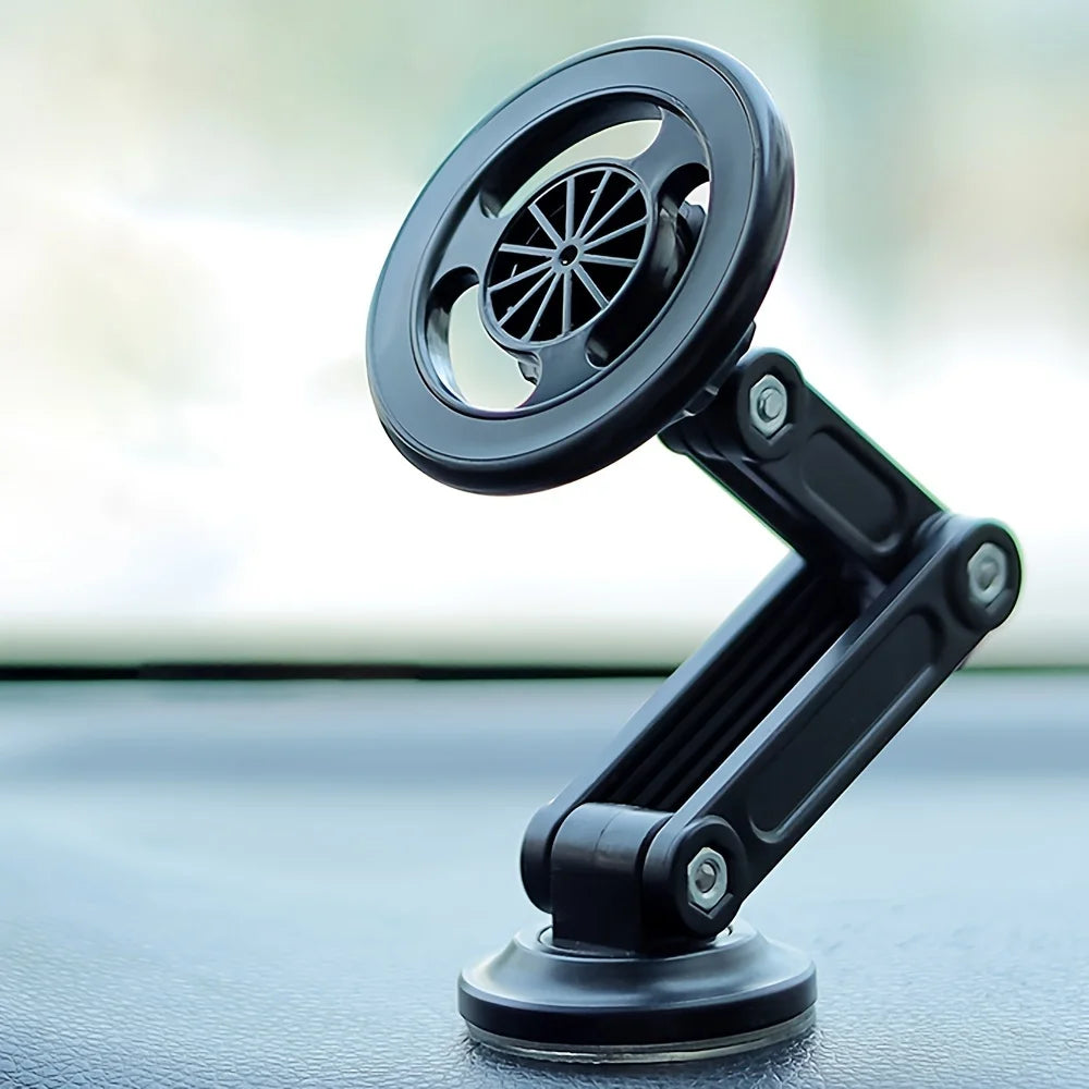 Black adjustable car phone mount with a flexible folding arm and circular magnetic base, mounted on a dashboard.