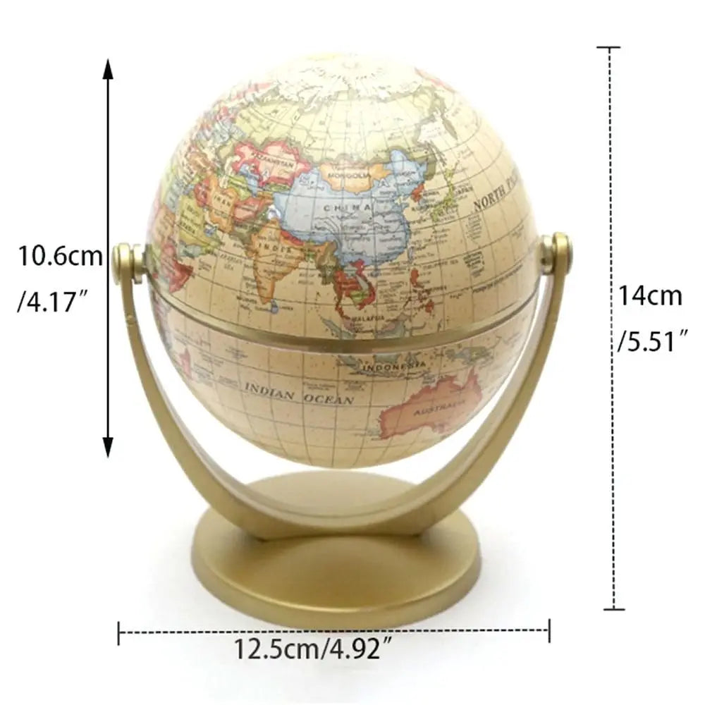 Desktop world globe with vintage-style map, cream background, and gold-toned stand, showing dimensions.