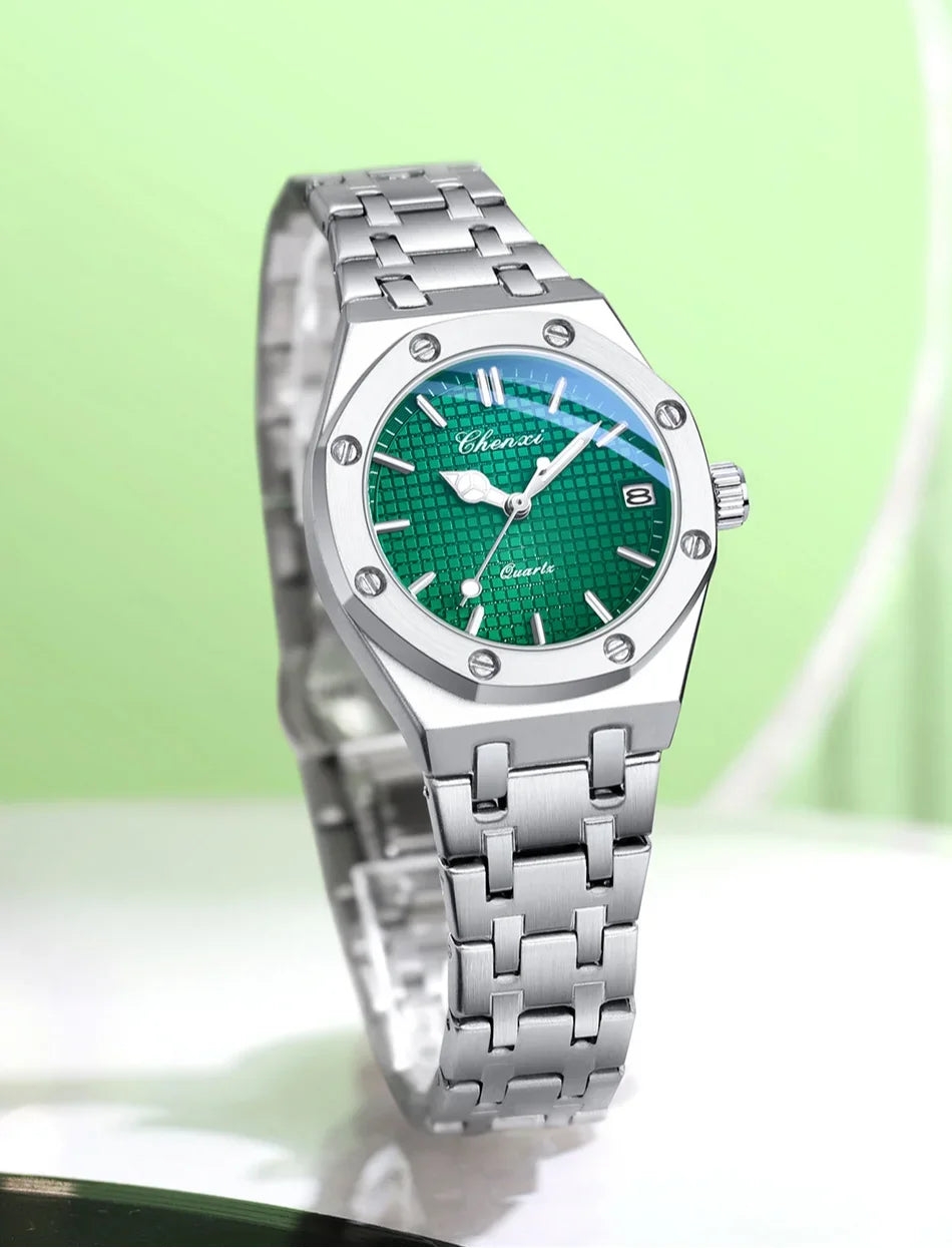 Luxury women’s analogue watch featuring a silver stainless steel bracelet and a textured green dial with date display.