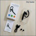 Black wireless Bluetooth earpiece with microphone, shown in packaging with manual, charging cable, and spare tips.
