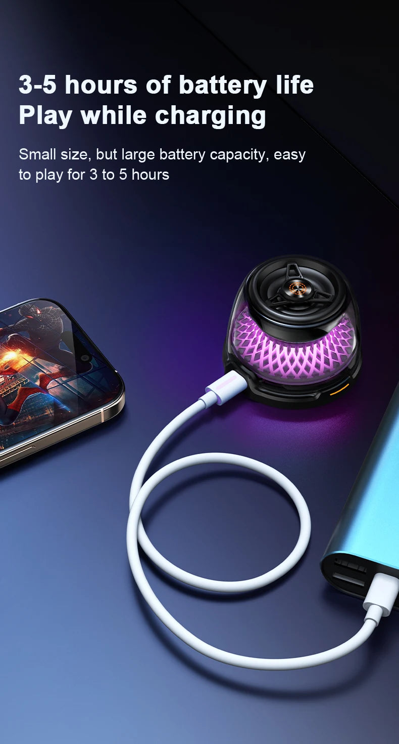 Small black magnetic Bluetooth speaker with glowing purple light, connected to a power bank via white USB cable.