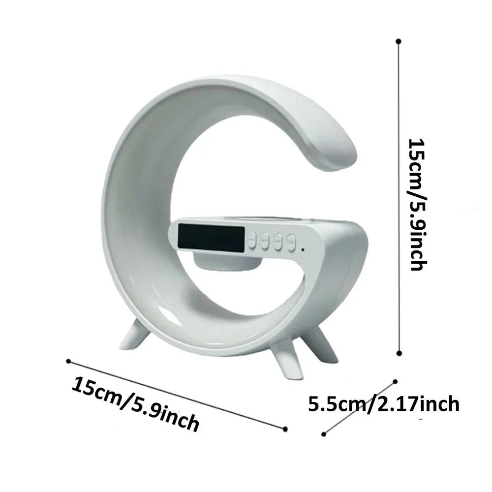 White G-shaped desk lamp with integrated Bluetooth speaker, wireless charging base, and digital display.