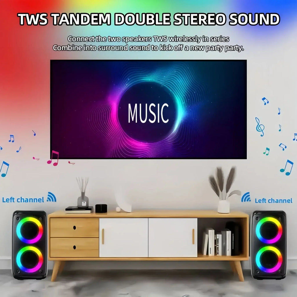 Two black portable karaoke speakers with colourful LED rings, wirelessly connected for stereo sound in a living room.