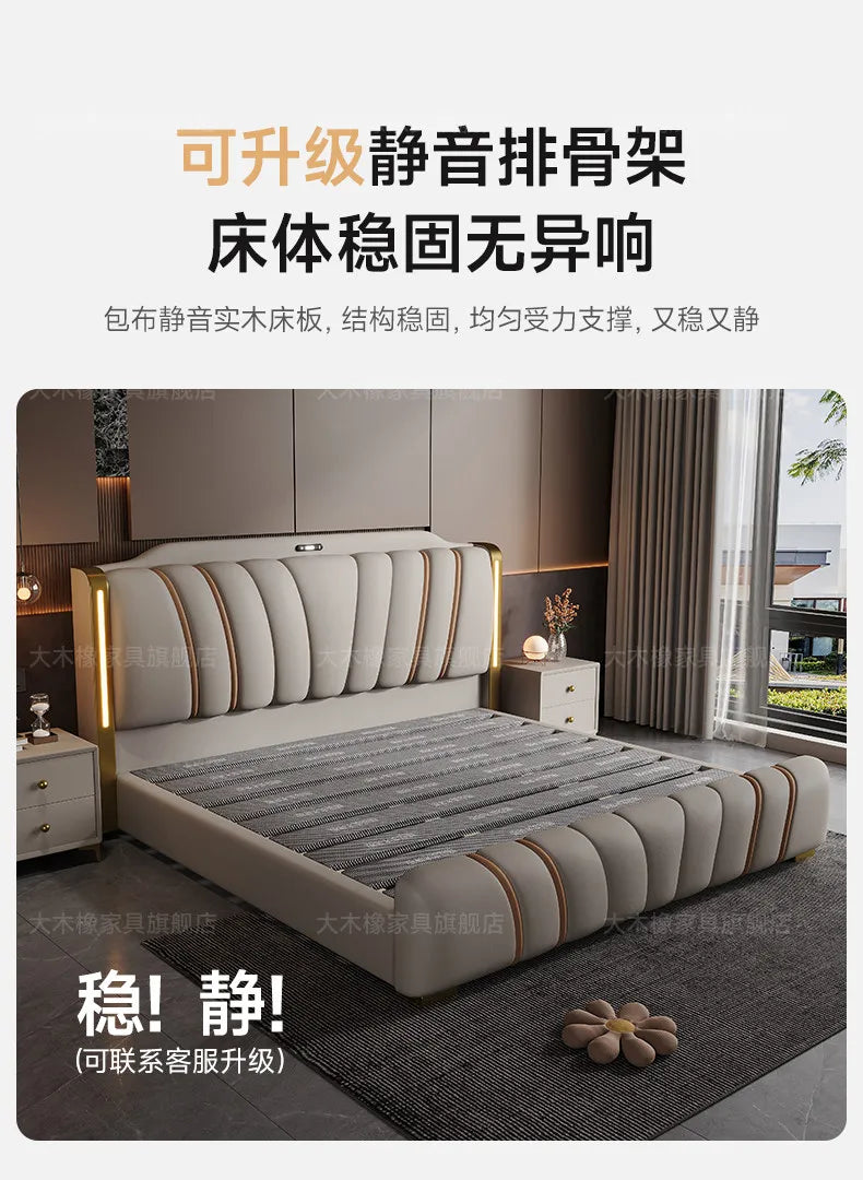 Luxury light grey French-style bed with a tufted headboard, integrated LED lighting, and gold metallic accents.
