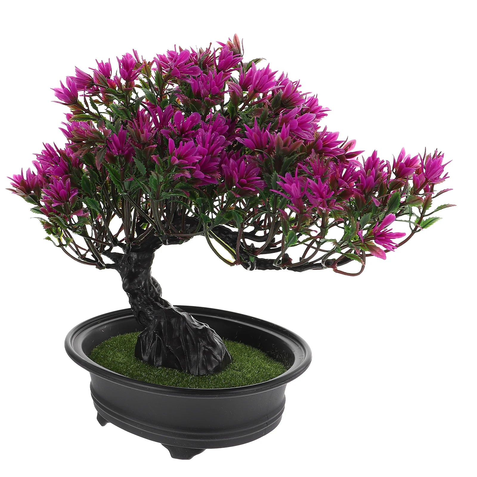 Artificial bonsai tree with vibrant purple flowers in a black oval pot with faux green grass, isolated on white.