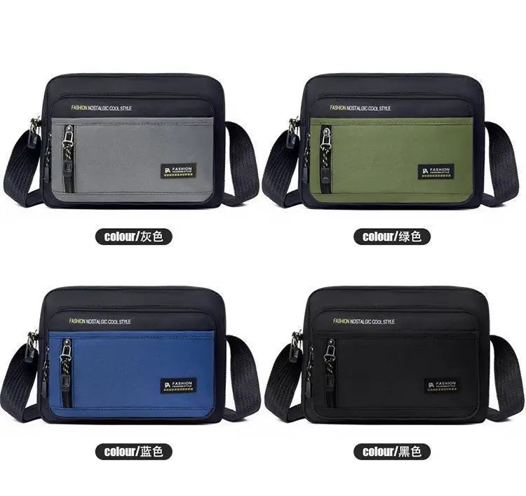 Four rectangular men’s crossbody bags in grey, green, blue, and black, each with a front zip pocket and shoulder strap.