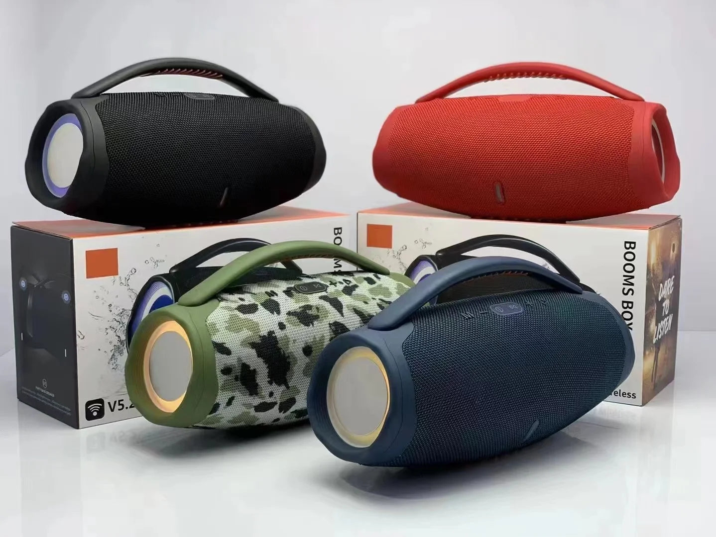 Four portable 100W waterproof speakers with handles in black, red, camo and blue, featuring built-in RGB light rings.