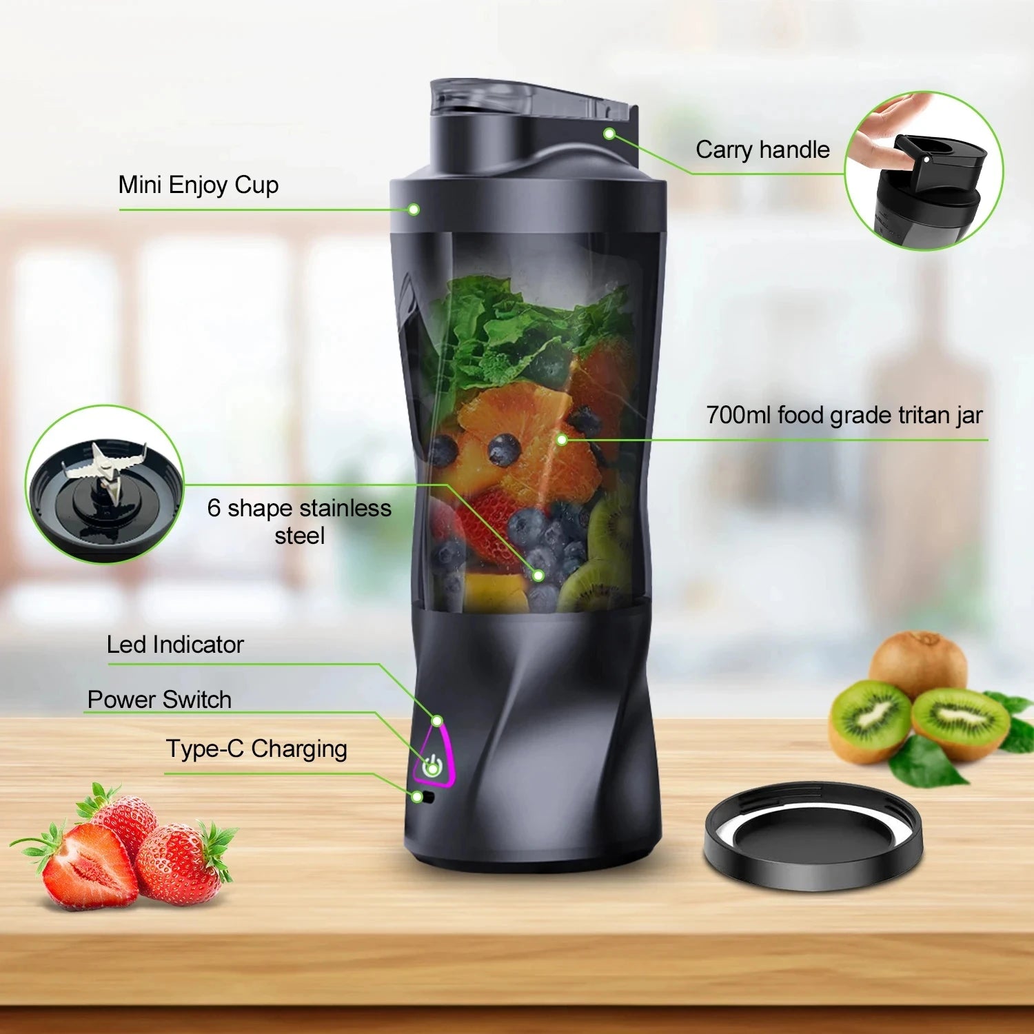 Black portable personal blender with a 700ml clear jar, stainless steel blades, and USB-C charging on a wooden surface.