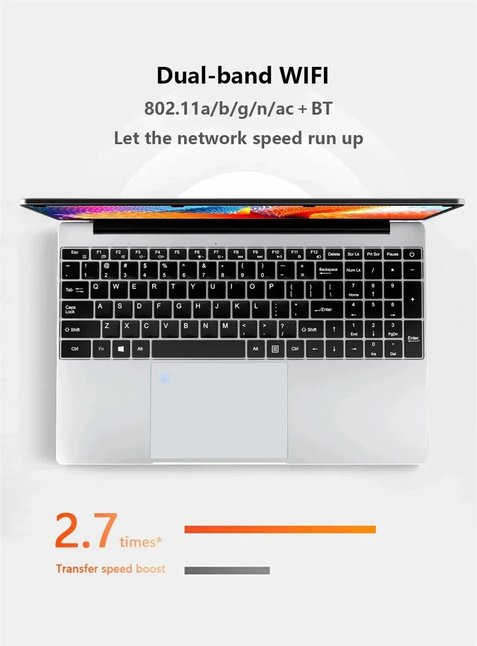 Silver 15.6-inch laptop with a full-sized keyboard and numeric keypad, featuring high-speed Wi-Fi and fast data transfer.