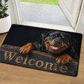 Black doormat featuring a smiling Rottweiler leaning on a rustic wooden sign that reads "Welcome".