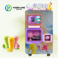 Multicolor slushie vending machine with touchscreen, dispensing area, and colorful fruit graphics.