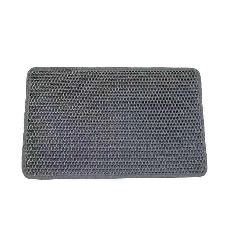 Grey, rectangular double-layer cat litter mat with a honeycomb top surface to trap litter effectively.