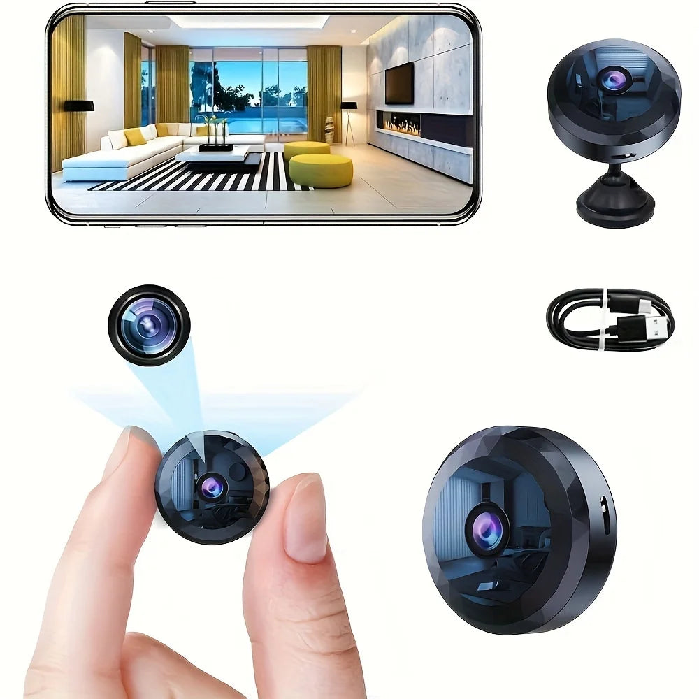 Small black plastic wireless security camera with a wide-angle lens, adjustable stand, and USB charging cable.