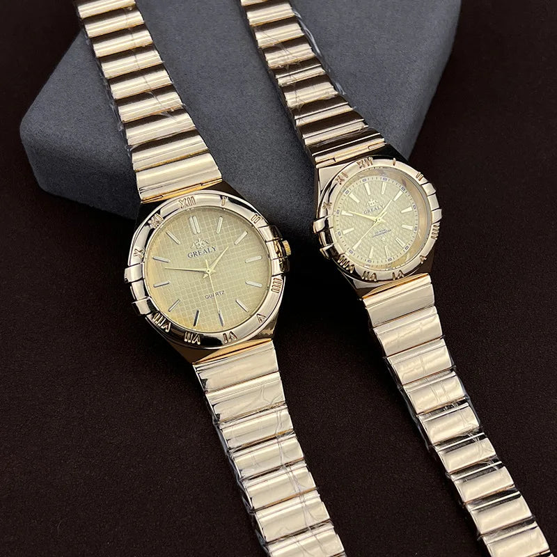 Two gold quartz wristwatches with textured dials, rounded bezels, and matching steel link bracelets.