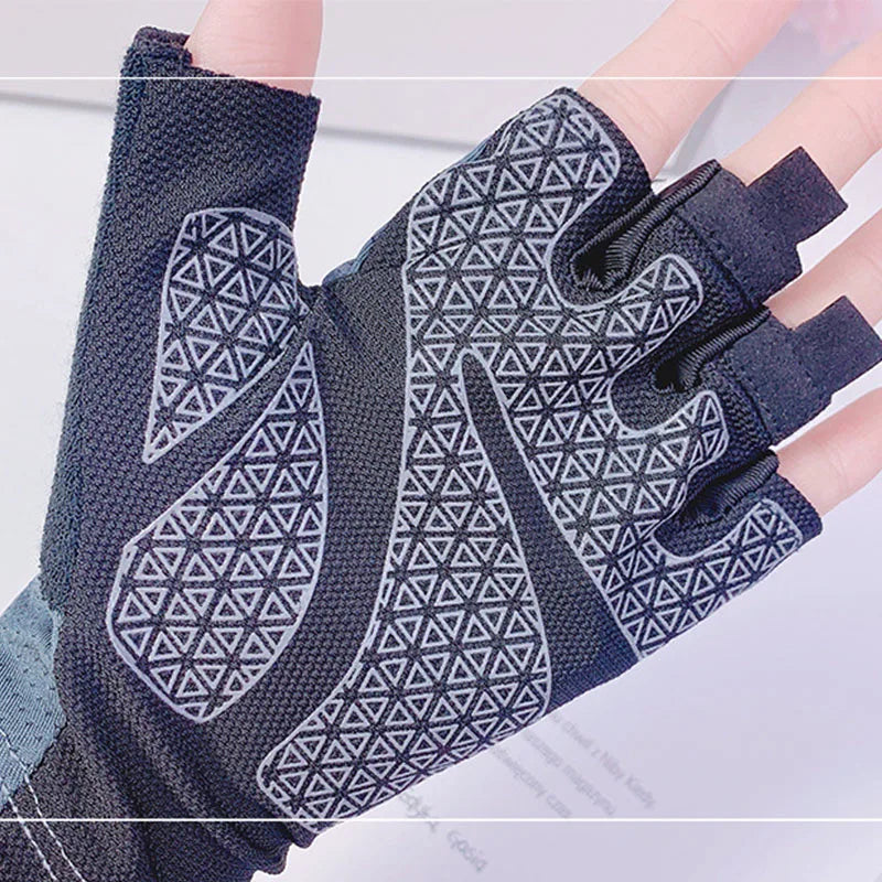 Black fingerless gym gloves with a grey geometric triangle pattern on the palm.