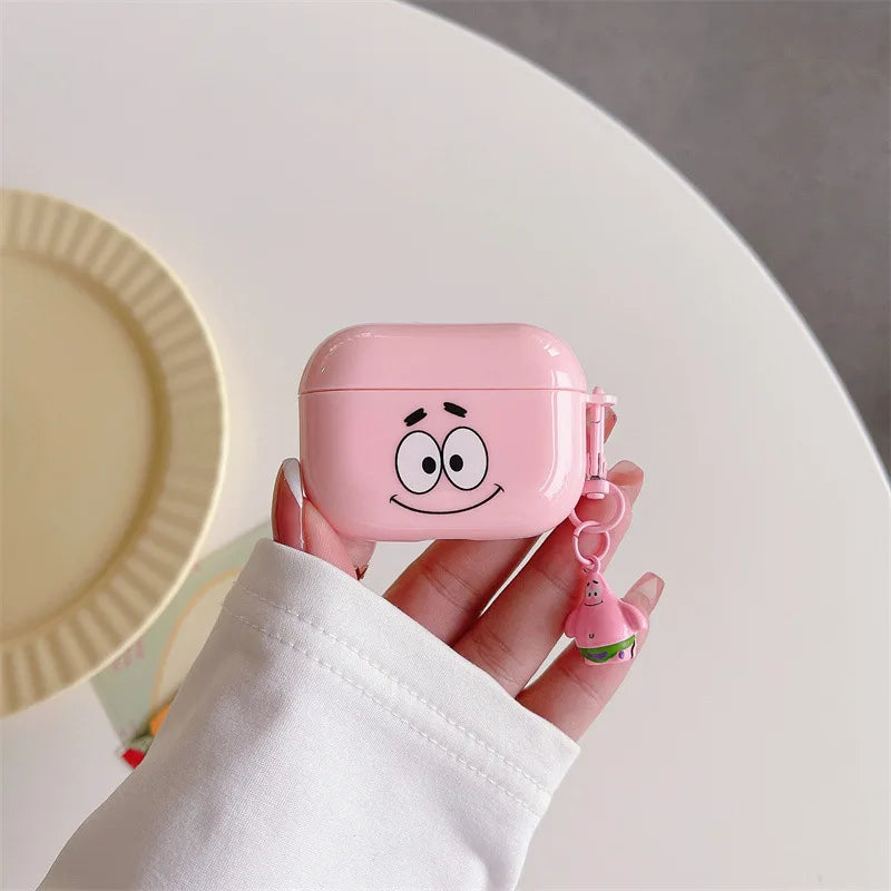 Pink silicone AirPods Pro case featuring a Patrick Star face design and matching character charm.
