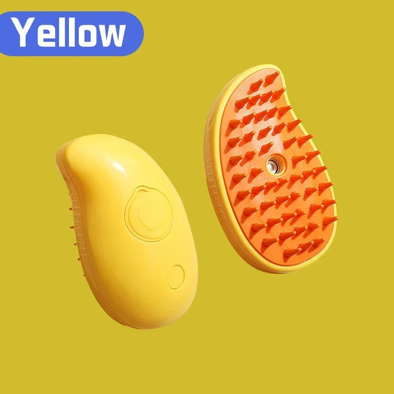 Yellow mango-shaped scalp massager brush with an orange silicone bristle head and textured handle.