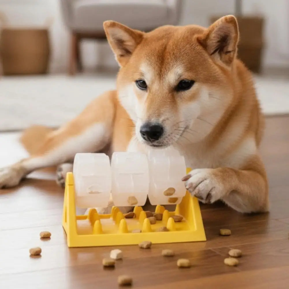 A Shiba Inu playing with a bright yellow interactive dog puzzle feeder with three clear spinning treat dispensers.