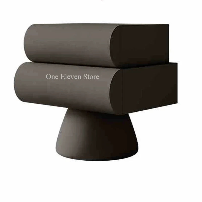 Modern matte dark grey bedside table with two rounded drawers on a pedestal base.