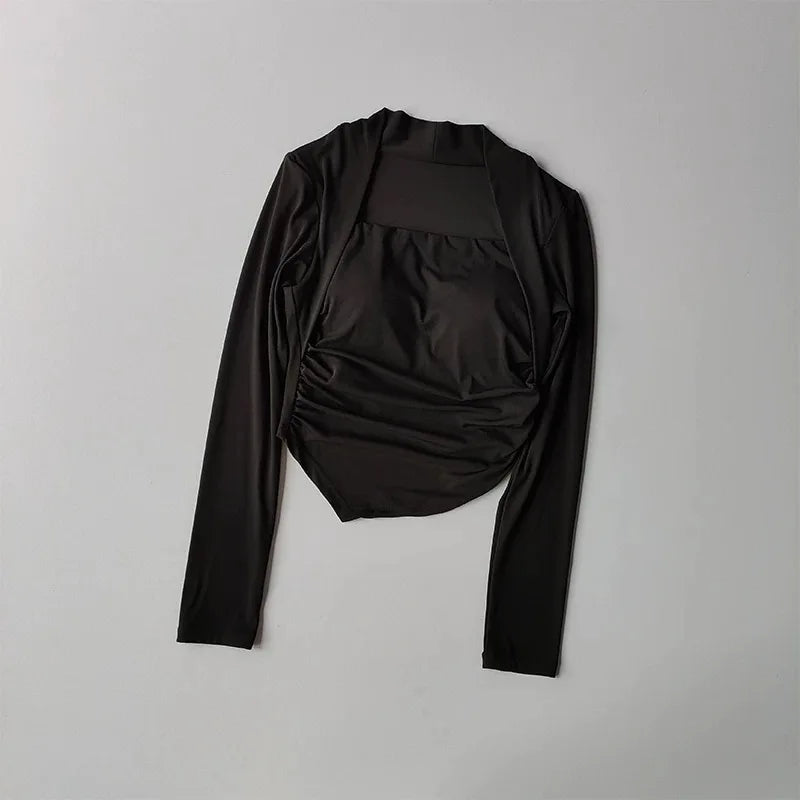 Black long-sleeve crop top with a square neckline, integrated shelf bra, and stylish ruched side detailing.