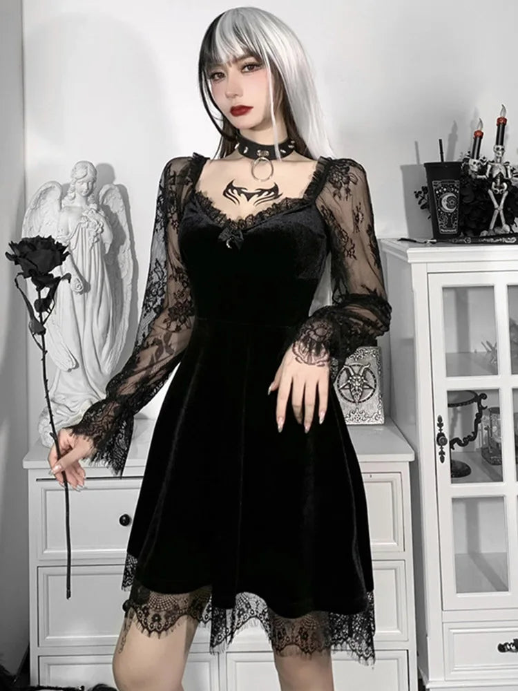 Black velvet mini A-line dress with sheer lace long sleeves, V-neck, and lace hem trim.