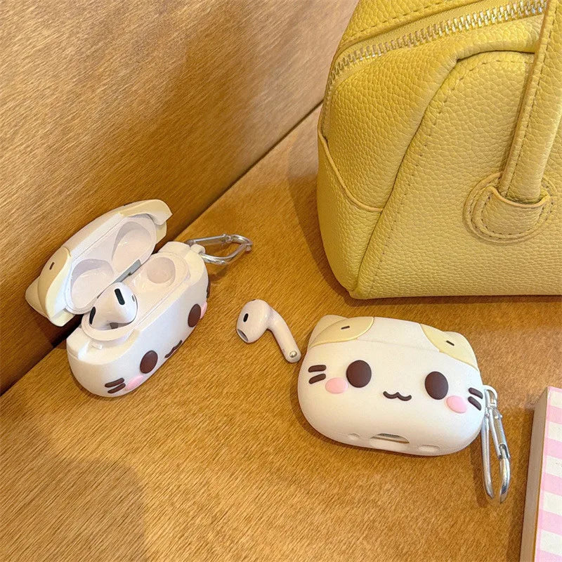 Cute white silicone cat-themed AirPods case with a silver carabiner clip. Compatible with Apple AirPods.